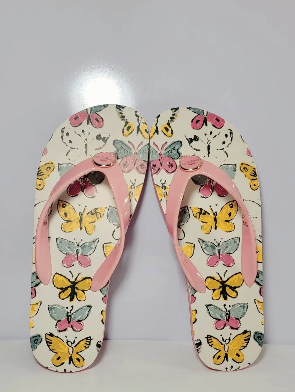 Coach Women's Size 8B  Zayn Pink Butterfly flip flops Slides.